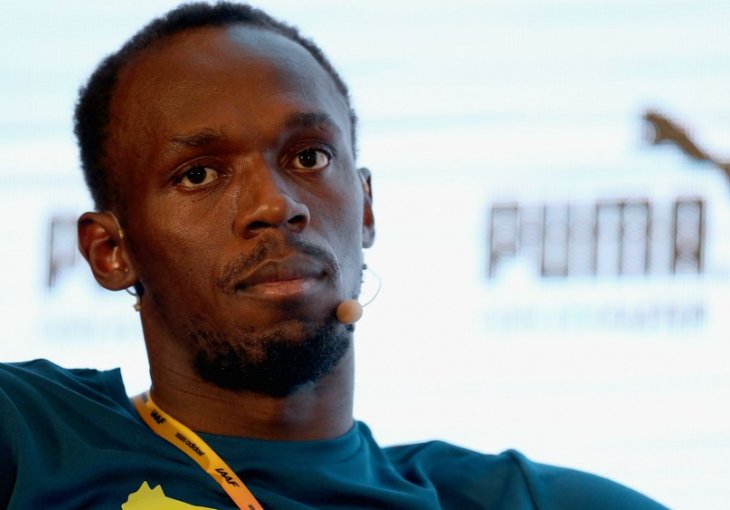 (FOTO) Sve zbog žene: Usain Bolt razočarao navijače Manchester Uniteda! 